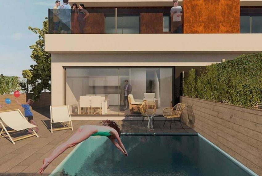 Une jeune fille plonge dans la piscine d'une villa à Pilar de la Horadada