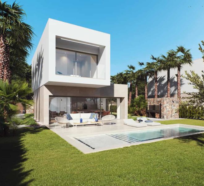 Villa moderne et design entourée de palmiers et avec une piscine scintillante. La villa est située dans le golf Las Colinas en Espagne.